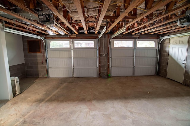 garage featuring a garage door opener