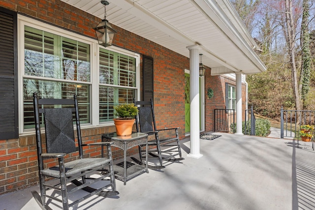 view of patio featuring a porch