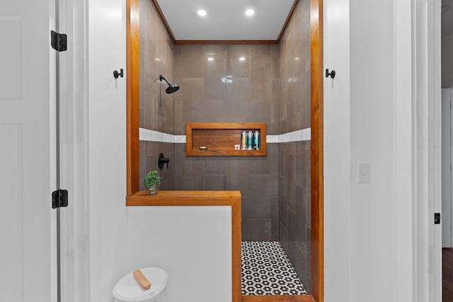 bathroom featuring a walk in shower and recessed lighting