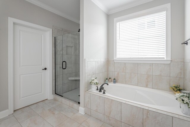 bathroom with a stall shower, tile patterned flooring, a garden tub, and crown molding