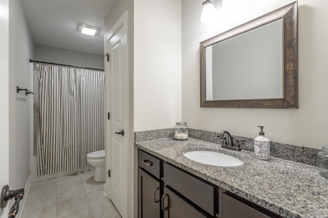 bathroom with toilet, tile patterned floors, curtained shower, and vanity