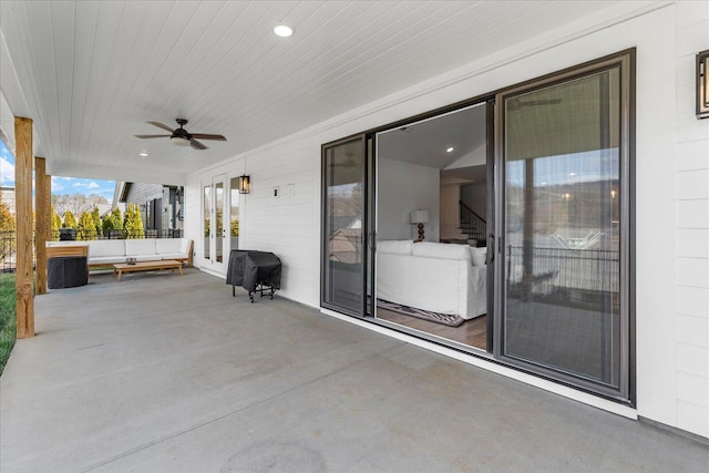 view of patio featuring grilling area and a ceiling fan