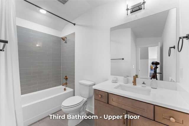 bathroom with visible vents, toilet, tile patterned flooring, tub / shower combination, and vanity