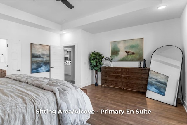 bedroom featuring a ceiling fan, ensuite bath, wood finished floors, recessed lighting, and baseboards