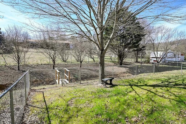 view of yard featuring fence