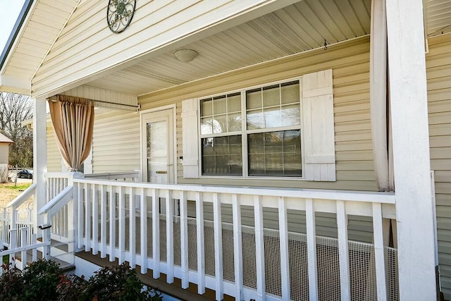 doorway to property with a porch