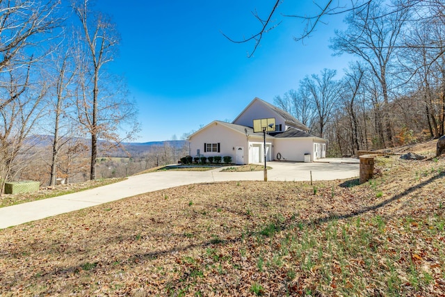 exterior space featuring driveway