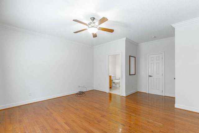 unfurnished room with crown molding, ceiling fan, light wood finished floors, and baseboards