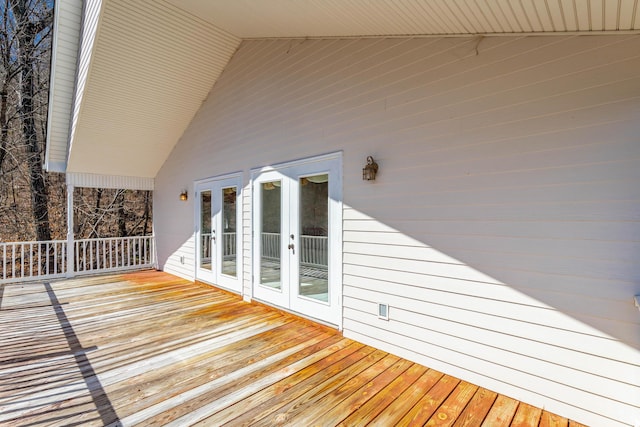 wooden terrace featuring french doors