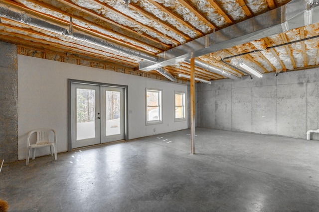 below grade area featuring french doors