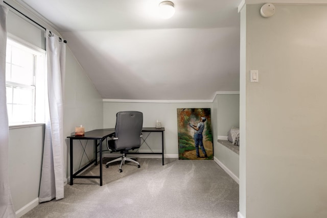 home office featuring baseboards, carpet floors, and lofted ceiling