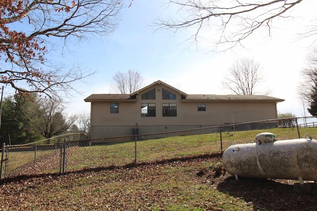 view of property exterior featuring fence