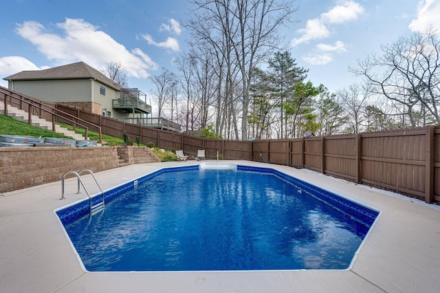 view of swimming pool featuring a fenced in pool and a fenced backyard