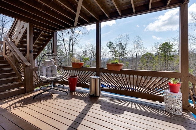 wooden terrace featuring stairway