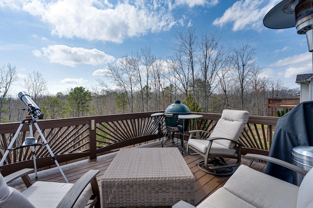 wooden terrace with grilling area