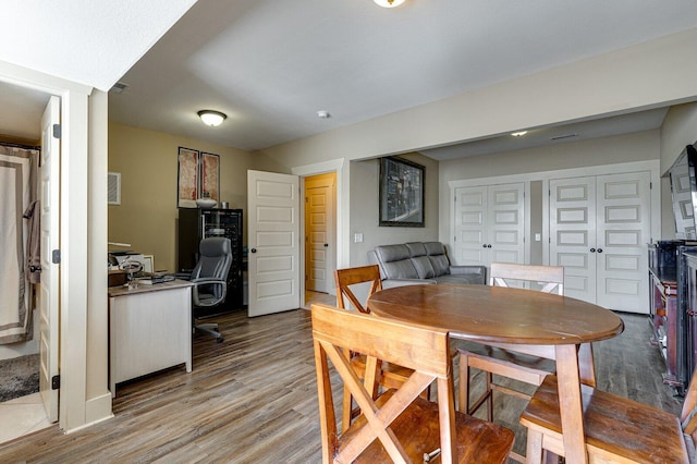 dining room with light wood-type flooring