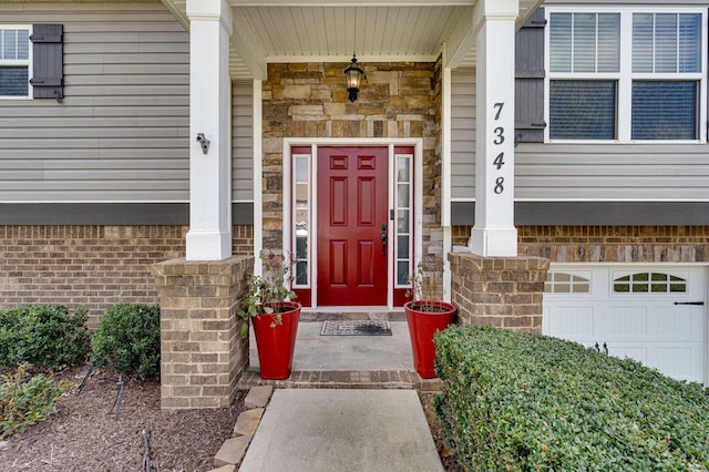 entrance to property with stone siding