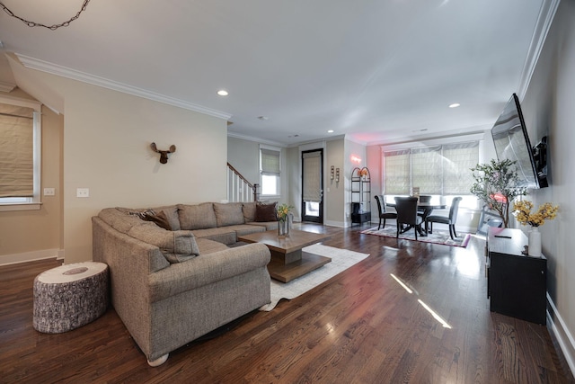 living area with recessed lighting, wood finished floors, baseboards, stairway, and crown molding