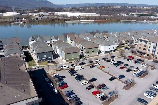 birds eye view of property with a residential view and a water view