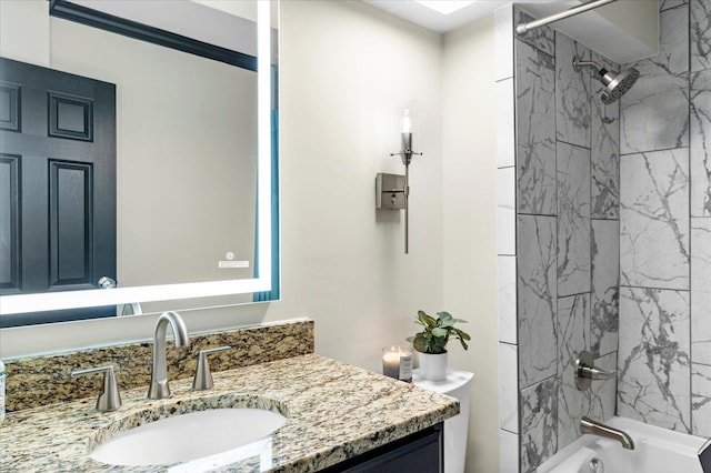 bathroom with vanity and shower / tub combination