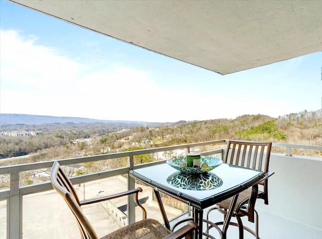 balcony with a wooded view