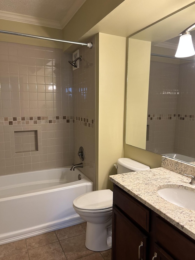 bathroom with vanity, tile patterned flooring, shower / washtub combination, crown molding, and toilet