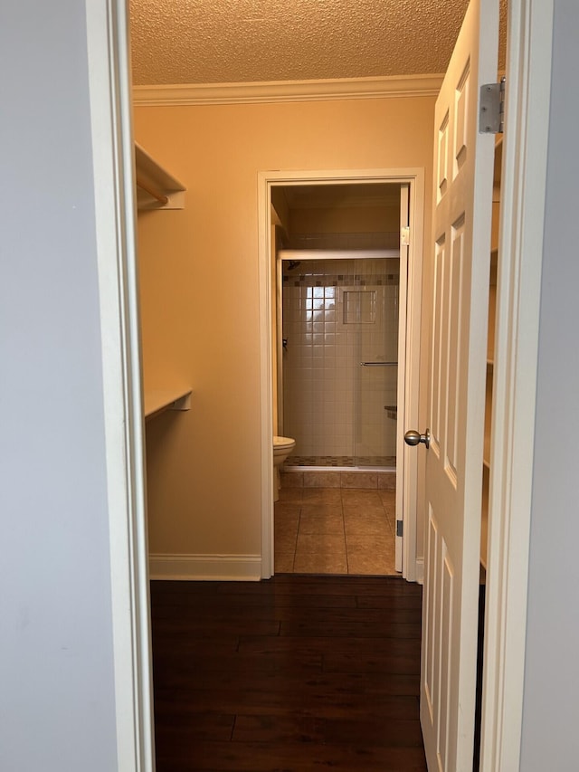 spacious closet with wood finished floors