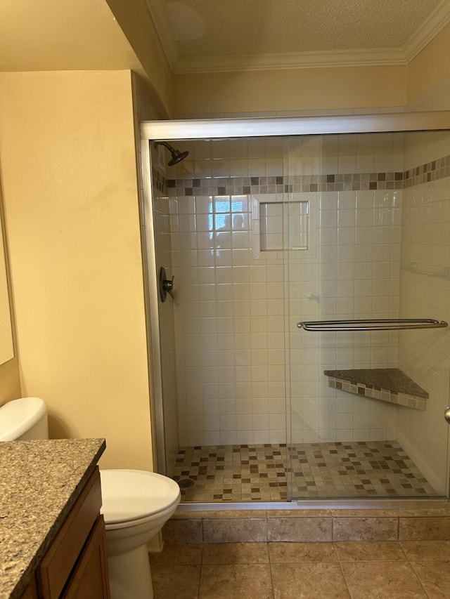 full bath with a stall shower, toilet, vanity, and ornamental molding