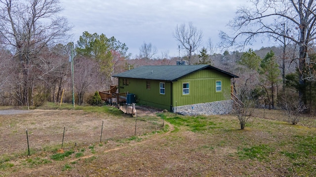 view of home's exterior with a chimney