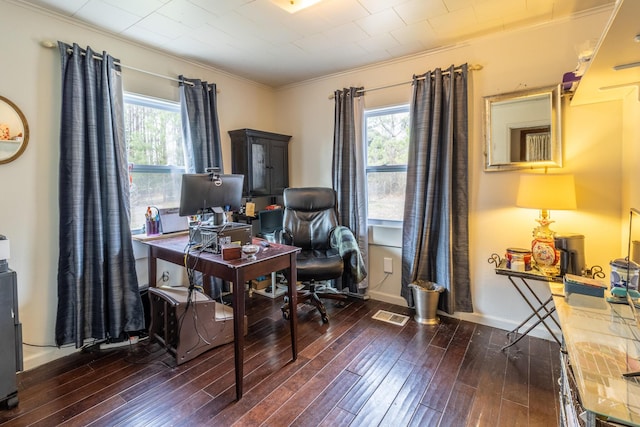 office with visible vents, wood finished floors, and a wealth of natural light