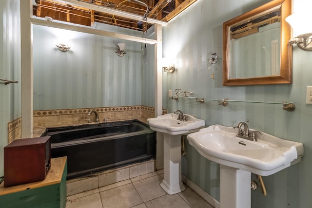 bathroom with a bathtub, a shower with shower curtain, and tile patterned floors