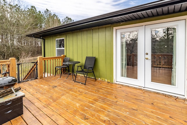 wooden deck featuring french doors