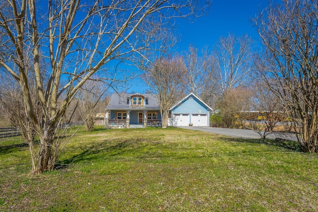 view of front of property with aphalt driveway, a porch, a front yard, and fence