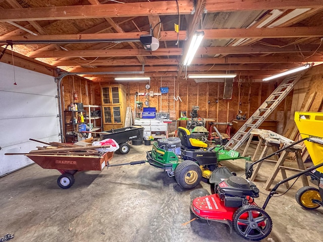 garage featuring a garage door opener