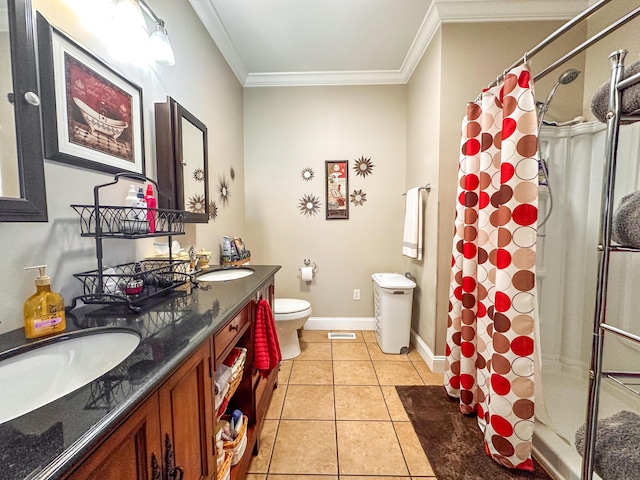 full bathroom featuring a sink, a stall shower, and crown molding