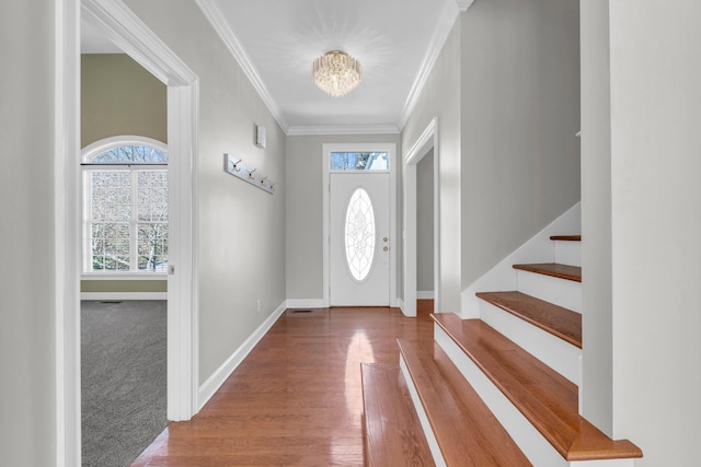 225 Blue Jay Pkwy, Ringgold, GA 30736 - foyer entrance featuring a notable chandelier, plenty of natural light, stairs, and wood finished floors