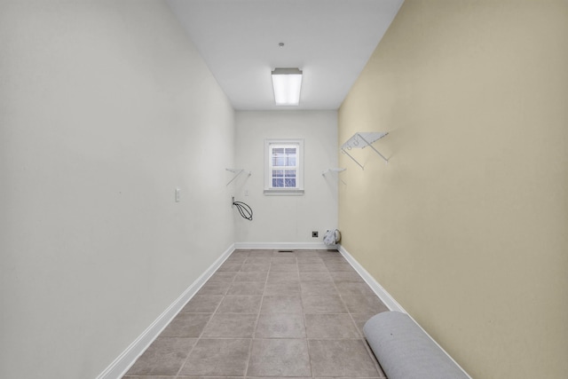 225 Blue Jay Pkwy, Ringgold, GA 30736 - laundry area with light tile patterned floors, laundry area, and baseboards