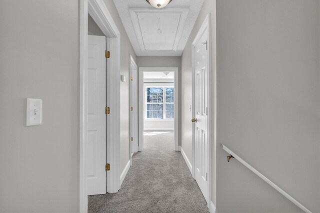 225 Blue Jay Pkwy, Ringgold, GA 30736 - corridor with baseboards, attic access, an upstairs landing, and carpet flooring