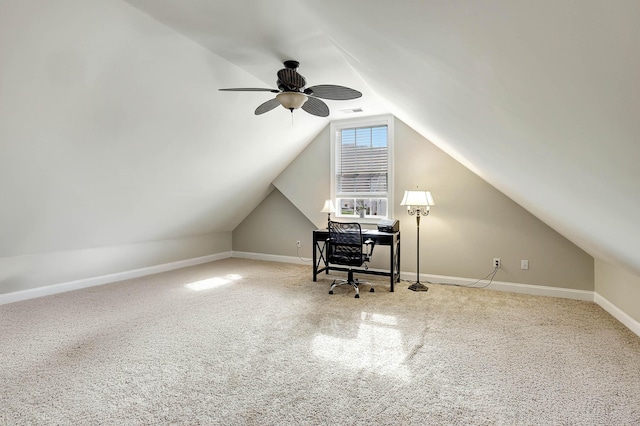 office area with visible vents, baseboards, lofted ceiling, carpet floors, and a ceiling fan