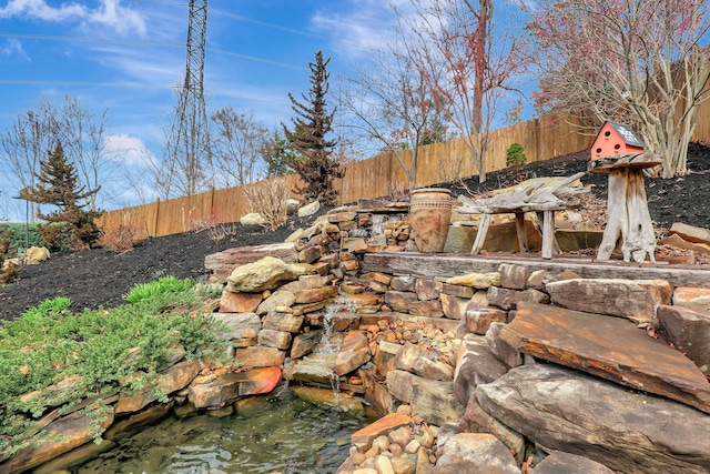 view of yard featuring a fenced backyard