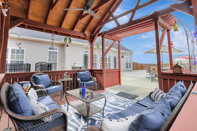 view of patio / terrace featuring outdoor lounge area, a ceiling fan, and fence