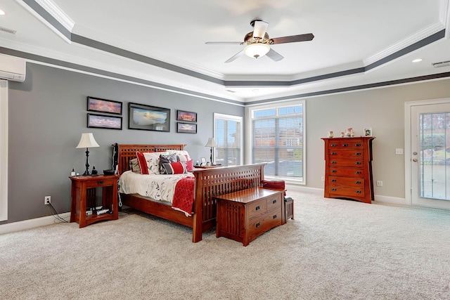 bedroom featuring a tray ceiling, access to outside, carpet floors, and ornamental molding