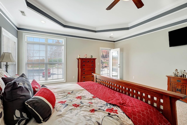 bedroom featuring visible vents, ceiling fan, a tray ceiling, ornamental molding, and recessed lighting