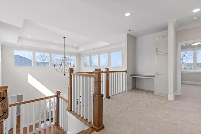 1825 River Breeze Dr, Soddy Daisy, TN 37379 - hallway featuring an upstairs landing, recessed lighting, a raised ceiling, and an inviting chandelier