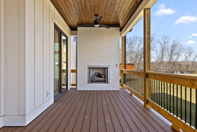 1825 River Breeze Dr, Soddy Daisy, TN 37379 - wooden terrace featuring a ceiling fan and an outdoor brick fireplace