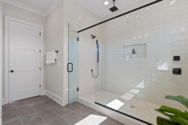 1825 River Breeze Dr, Soddy Daisy, TN 37379 - full bathroom featuring tile patterned floors, baseboards, a shower stall, and crown molding