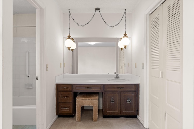 full bathroom featuring vanity, baseboards, and shower / bathtub combination