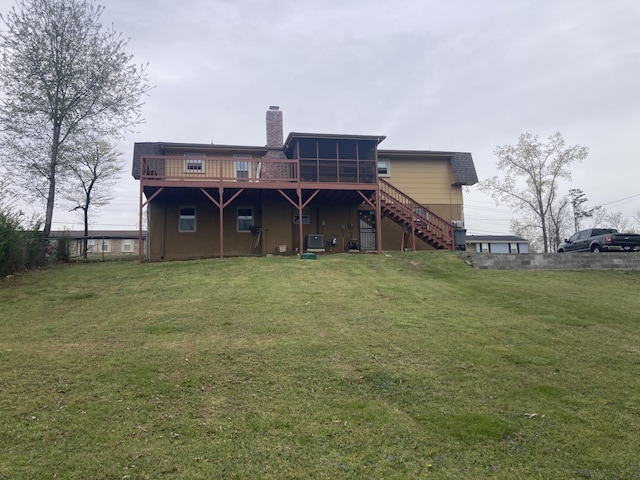 2813 Nile Rd, Chattanooga, TN 37421 - rear view of property with stairs, a deck, a yard, a chimney, and a sunroom