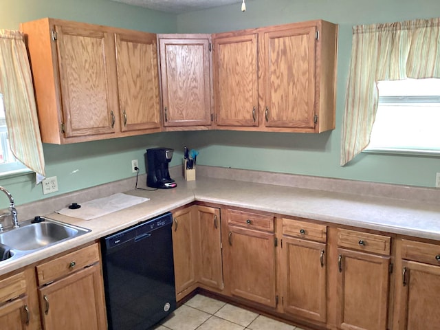 2813 Nile Rd, Chattanooga, TN 37421 - kitchen with a sink, light countertops, light tile patterned floors, and black dishwasher