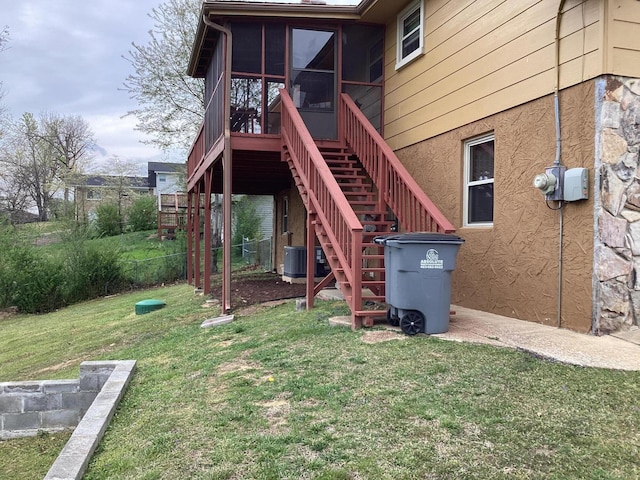 2813 Nile Rd, Chattanooga, TN 37421 - exterior space with stairs, a sunroom, central AC, and a lawn
